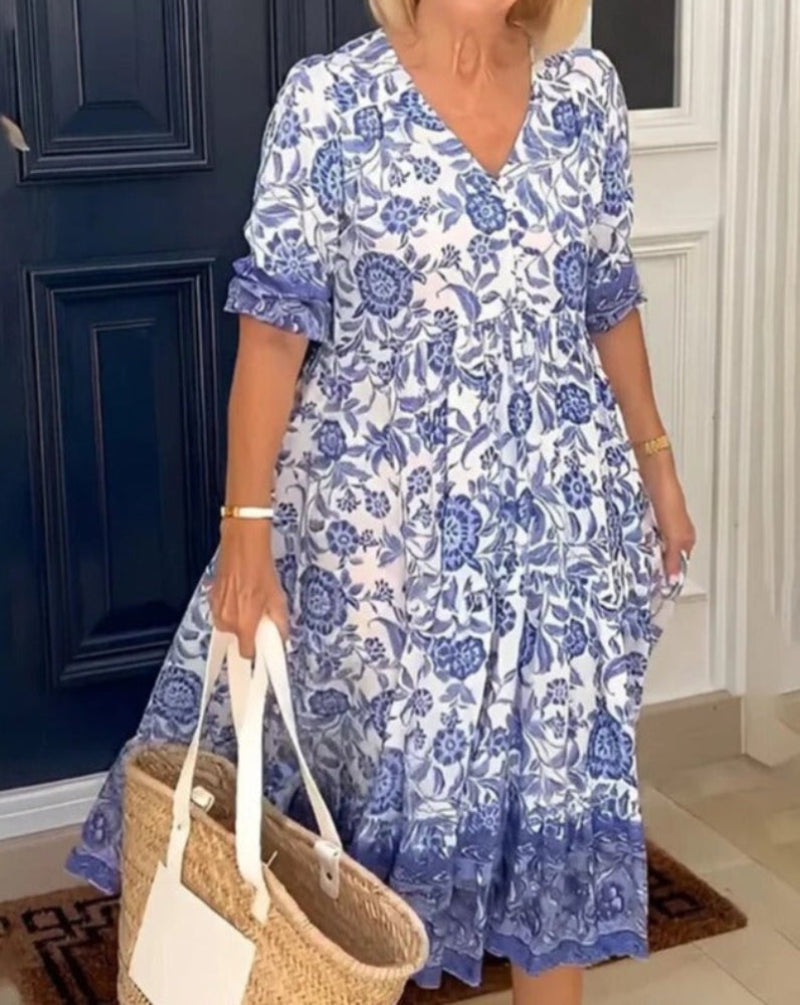 Zvenia – Zwiewna sukienka midi w kwiaty