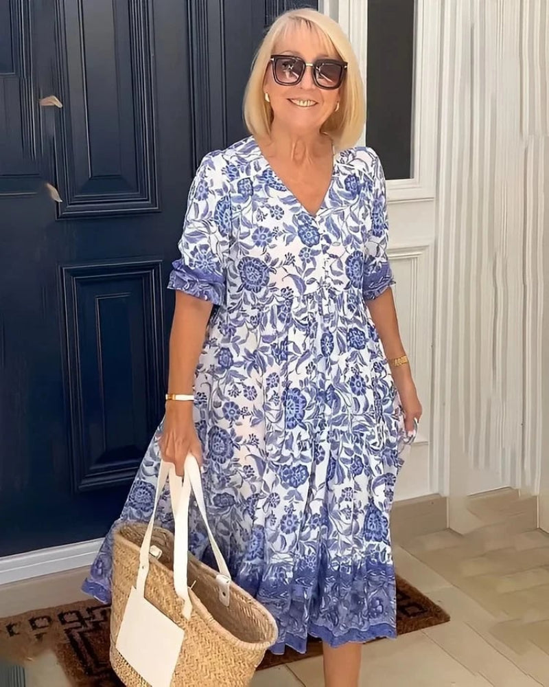 Zvenia – Zwiewna sukienka midi w kwiaty